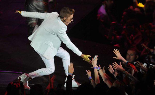 Justin Bieber performs at the 02 Arena in London, England, March 4, 2013. (Jim Dyson/Getty Images)