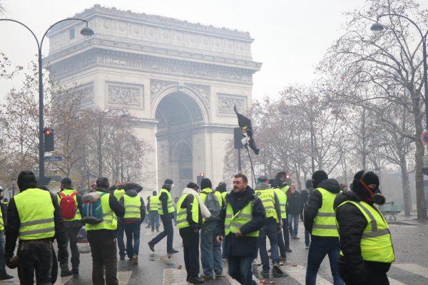 Yellow vest protesters gather in Paris on Dec. 1, 2018. (David Vives/The Epoch Times)