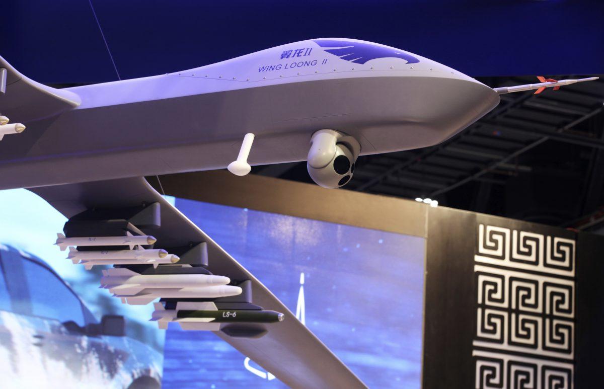 A model of the Chinese Wing Loong II weaponized drone is displayed at a military drone conference in Abu Dhabi, the United Arab Emirates, on Feb. 25, 2018. (Jon Gambrell/AP)