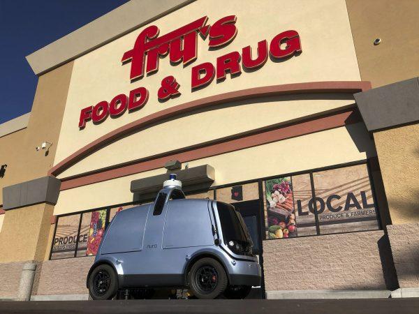 An autonomous vehicle called an R1 created to deliver groceries is  outside a Fry’s grocery store, which is owned by Kroger Co., in Scottsdale, Ariz., on Dec. 18, 2018. (Brian Skoloff/AP)