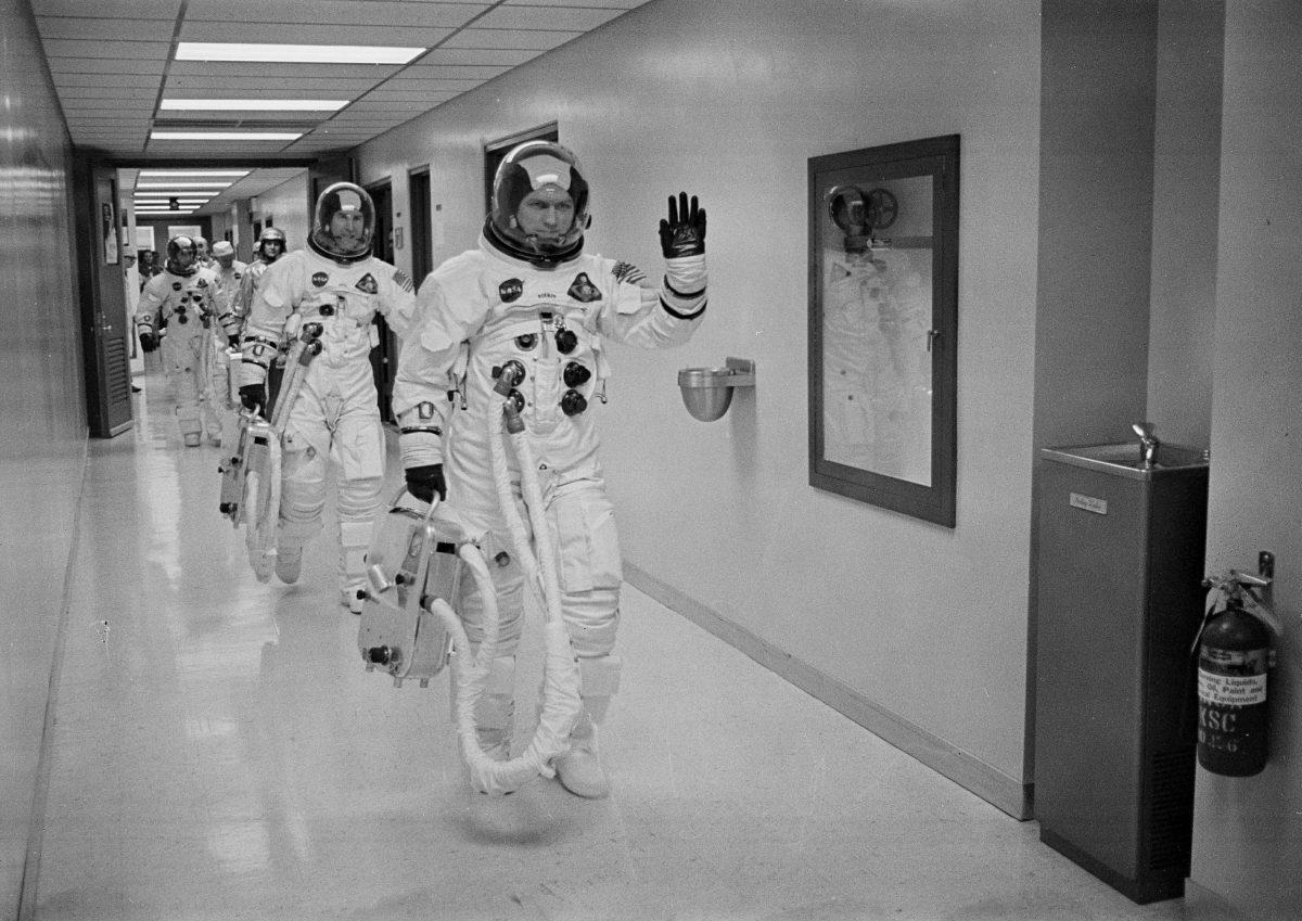 Apollo 8 Commander Col. Frank Borman leads the way as he, and fellow astronauts Command Module Pilot Capt. James A Lovell Jr., and Lunar Module Pilot Maj. William A. Anders head to the launch pad at the Kennedy Space Center, Fla., on Dec 21, 1968. (NASA/AP)