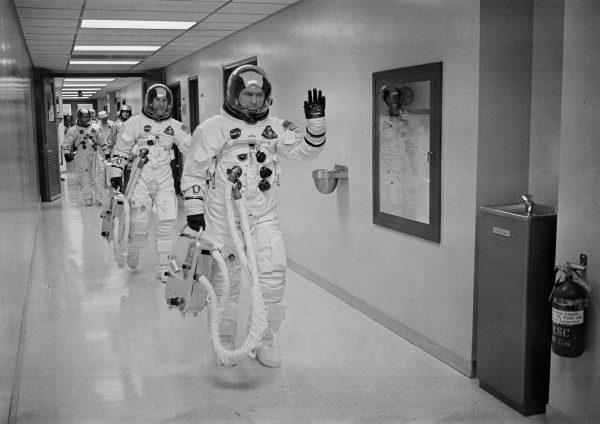 Apollo 8 Commander Col. Frank Borman leads the way as he, and fellow astronauts Command Module Pilot Capt. James A Lovell Jr., and Lunar Module Pilot Maj. William A. Anders head to the launch pad at the Kennedy Space Center in Florida, on Dec 21, 1968. (NASA/AP)