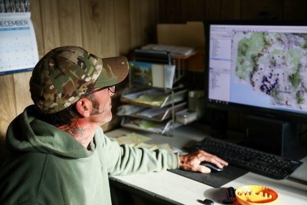 Tim Foley, founder of Arizona Border Recon, shows his map of cartel scout locations on the U.S. side of the U.S.–Mexico border in his office at Arivaca, Ariz., on Dec. 8, 2018. (Charlotte Cuthbertson/The Epoch Times)