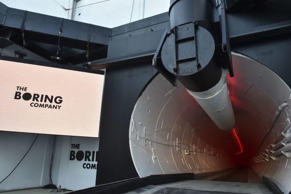The Boring Co. signage is displayed at the tunnel entrance before an unveiling event for the Boring Co. Hawthorne test tunnel in Hawthorne, Calif., Tuesday, Dec. 18, 2018. (Robyn Beck/Pool Photo/AP)