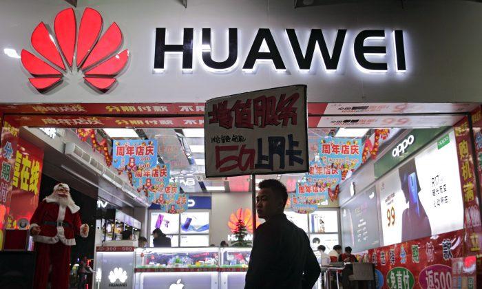 Standard Chartered Follows HSBC in Cutting Service to Huawei