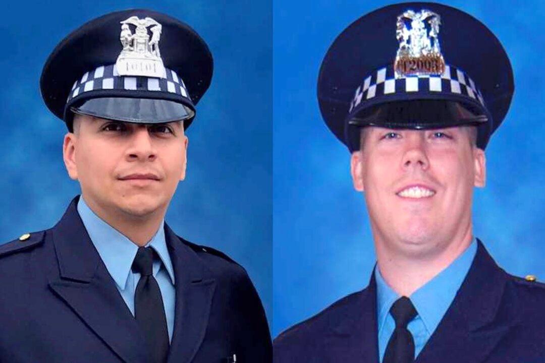 Man Arrested in Connection With Deaths of Two Chicago Police Officers Hit by Train
