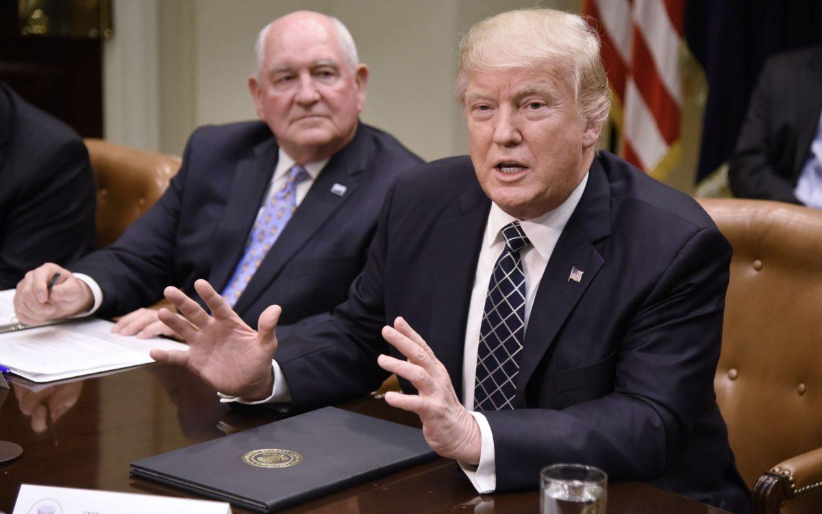 President Donald (R) and Agriculture Secretary Sonny Perdue in the Roosevelt Room of the White House on April 25, 2017. (Olivier Douliery-Pool/Getty Images)