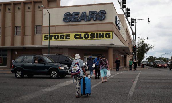 A sign announcing the store will be closing hangs above a Sears store in Chicago, Ill., on Aug. 24, 2017. (Scott Olson/Getty Images)
