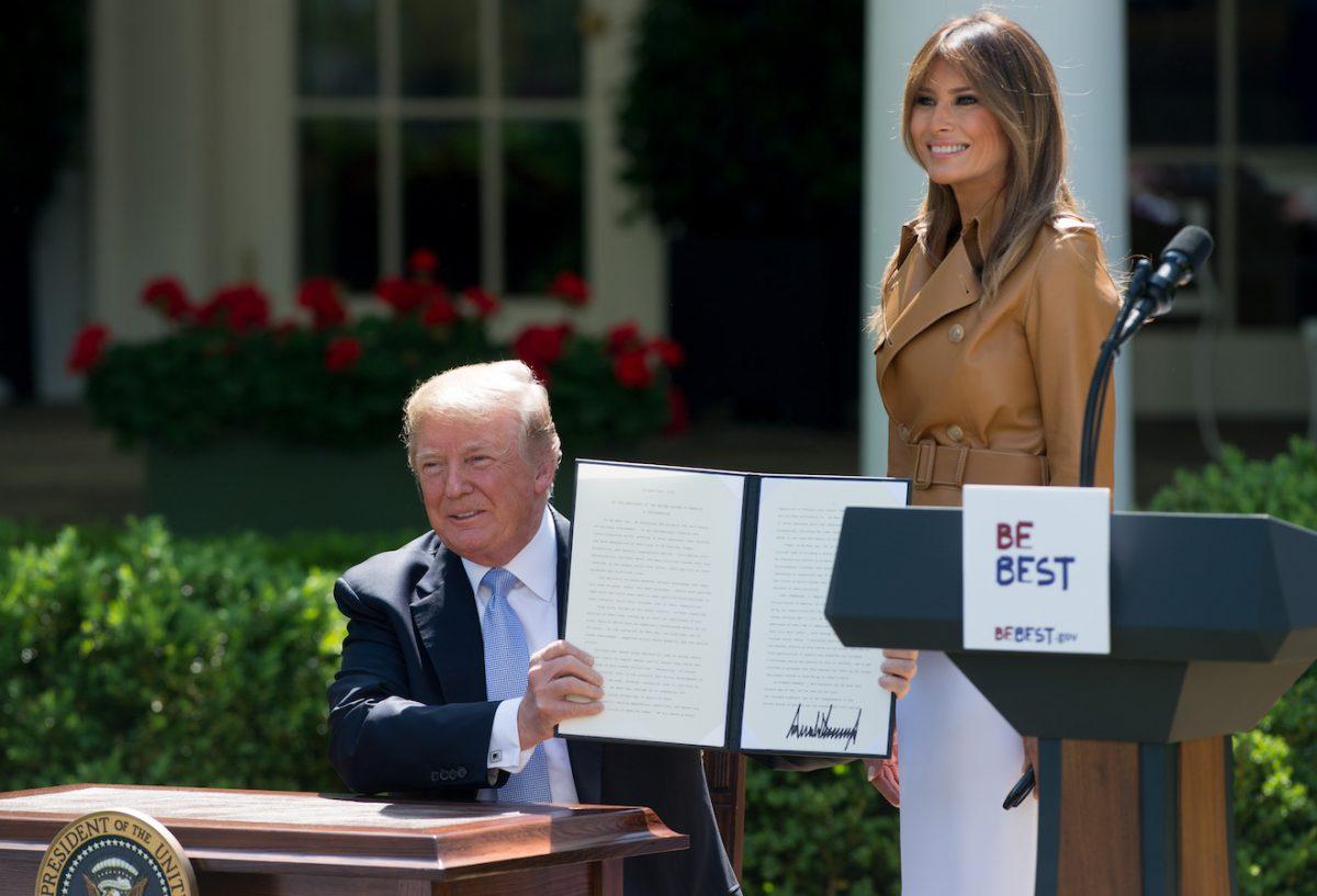 President Donald Trump signs a proclamation alongside First Lady Melania Trump after she announced her "Be Best" children's initiative in the Rose Garden of the White House in Washington, on May 7, 2018. (Saul Loeb/AFP/Getty Images)