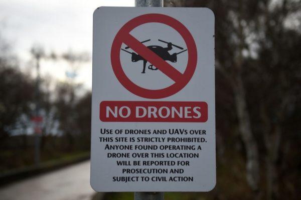 A "No Drones" sign alerting members of the public that the use of drones or unmanned aerial vehicles (UAV) is prohibited, is outside Manchester United's Carrington Training complex in Manchester, England, on Dec. 20, 2018. (Oli Scarff/AFP/Getty Images)