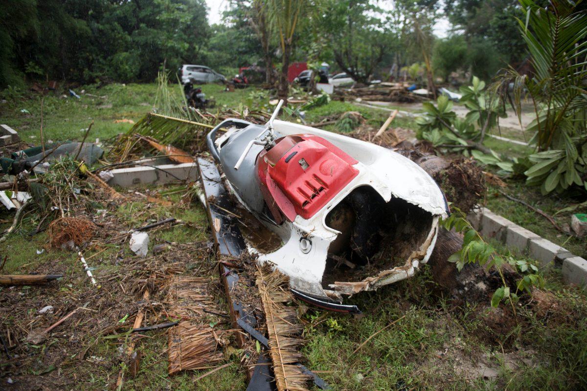 A broken jet ski is among debris after a tsunami hit Tanjung Lesung beach in Banten, Indonesia, Dec. 22, 2018. (Antara Foto/Akbar Nugroho Gumay/ via Reuters)