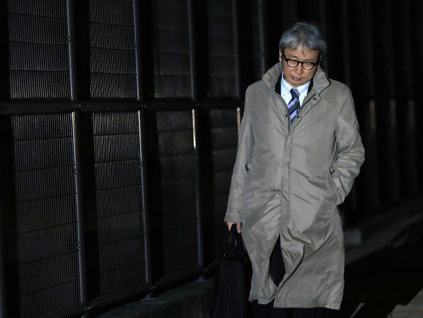 Motonari Otsuru, defense lawyer of former Nissan chairman Carlos Ghosn, leaves Tokyo Detention Centre on Dec. 20, where Ghosn and another former executive Greg Kelly are being detained in Tokyo, Japan. (Eugene Hoshiko/AP)