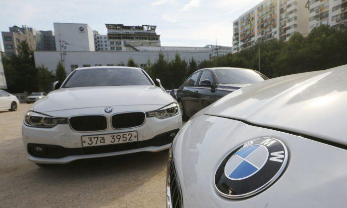Investments, Legal Charge Put Brakes on BMW