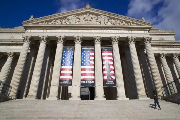 People walk up the steps even though the National Archives is closed with the partial government shutdown in Washington on Dec. 22, 2018. (Alex Brandon/AP)