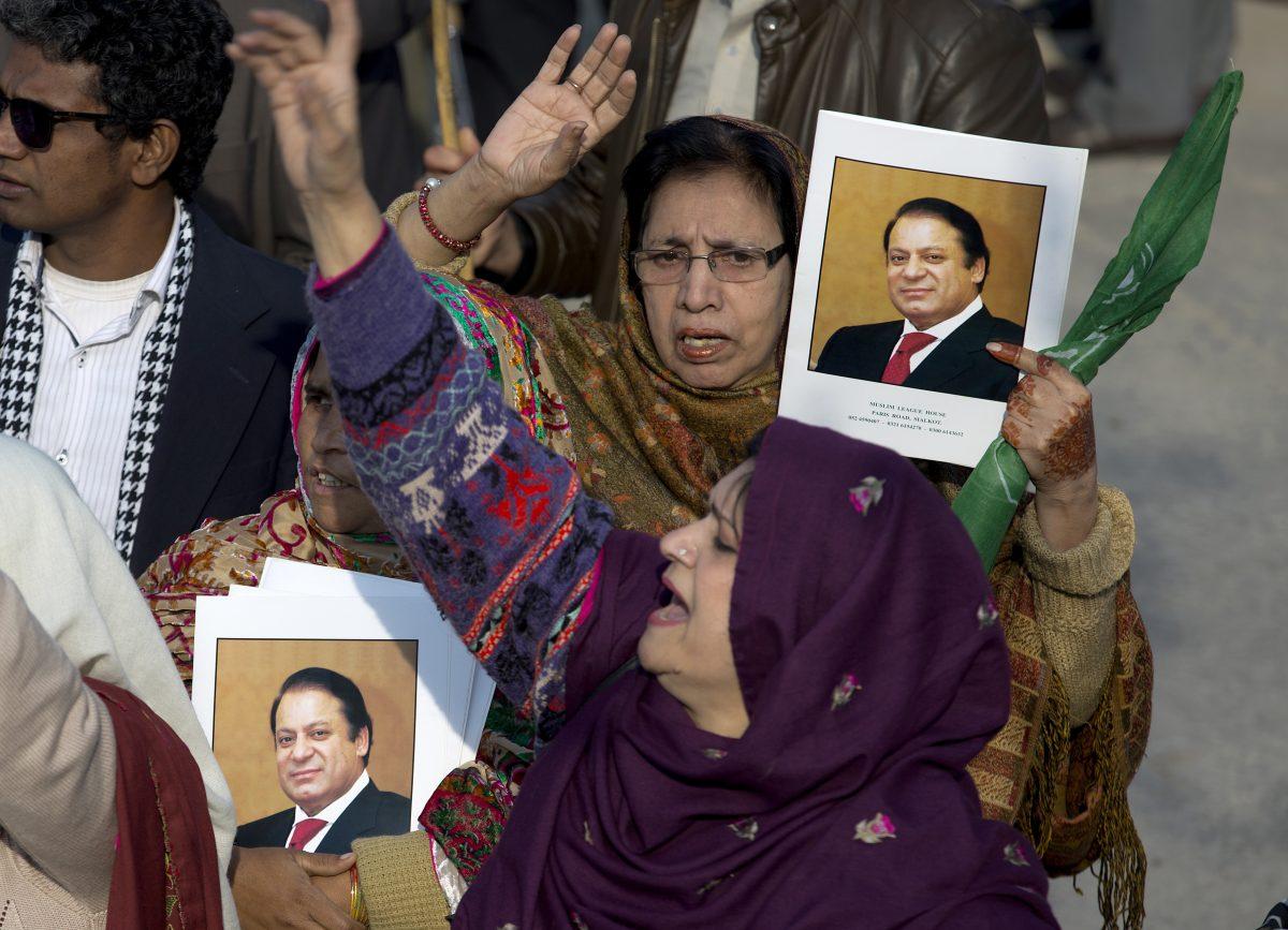 Supporters of former Pakistani Prime Minister Nawaz Sharif shout slogans against the government outside an accountability court in Islamabad, Pakistan, Monday, Dec. 24, 2018. (AP Photo/B.K. Bangash)
