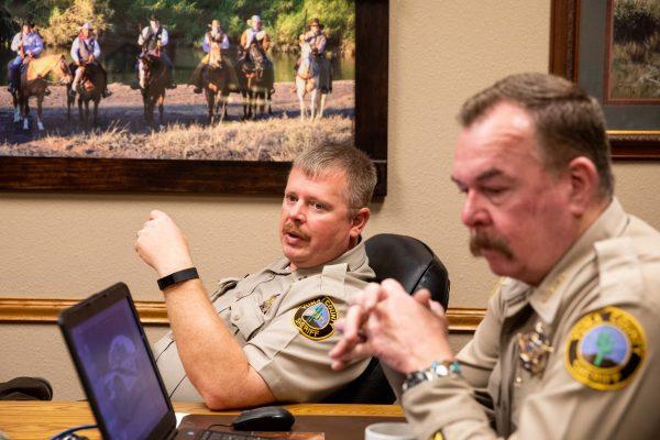 Yuma County Sheriff Leon Wilmot (R) and Capt. Eben Bratcher talk about border security in the sheriff's office in Yuma, Ariz., on May 25, 2018. (Samira Bouaou/The Epoch Times)