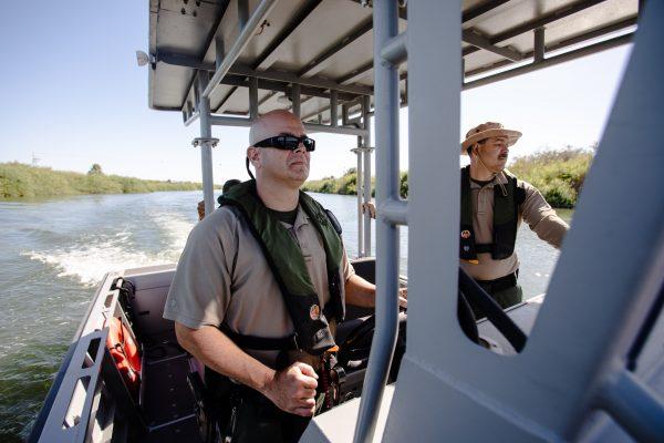 Customs and Border Protection agents patrol the Colorado River at the intersection of California, Arizona, and Mexico, on May 25. (Samira Bouaou/The Epoch Times)