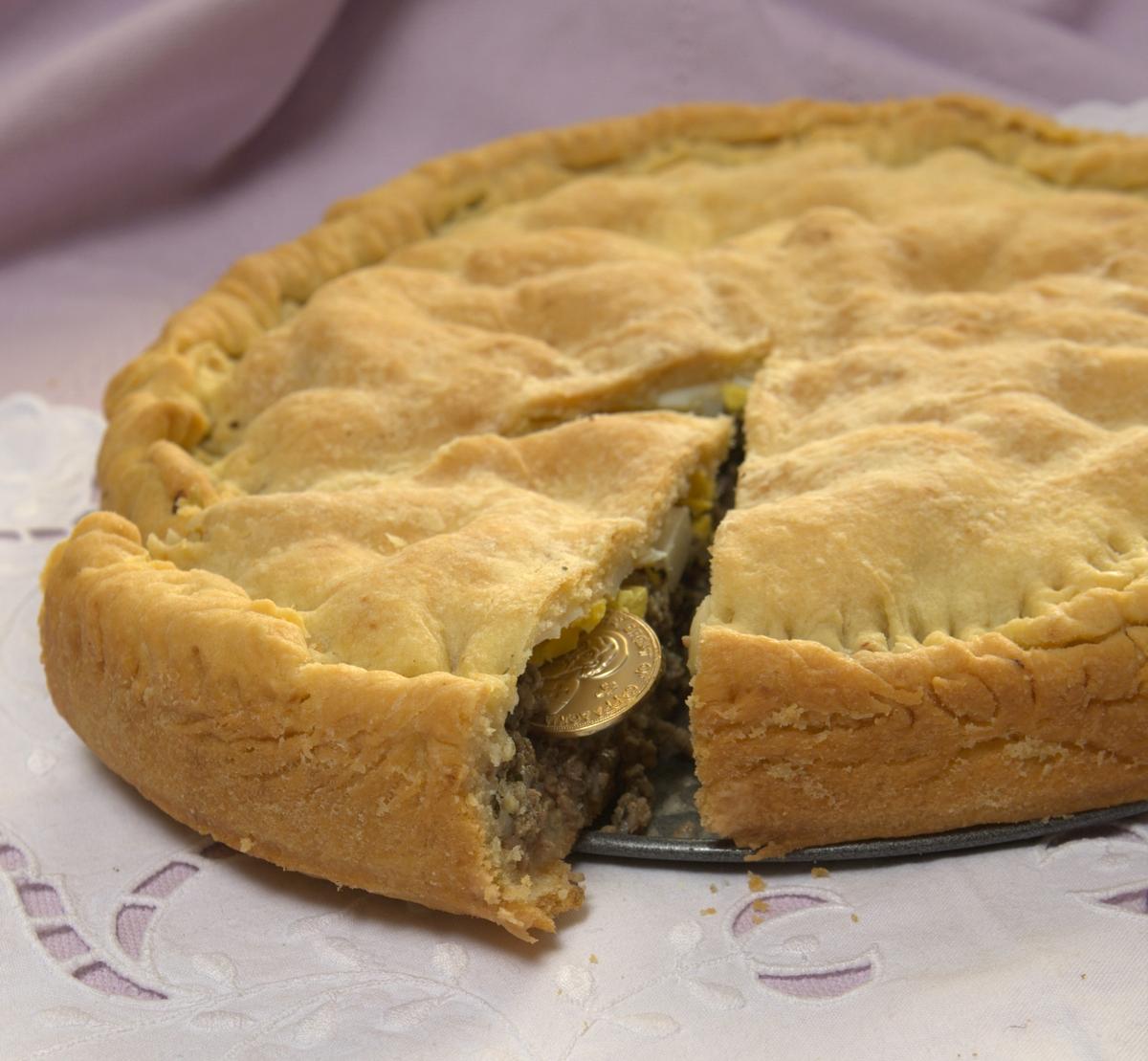 The lucky finder of the hidden coin in a Greek vasilopita is assured blessings in the new year. (Courtesy of Maria Loi)