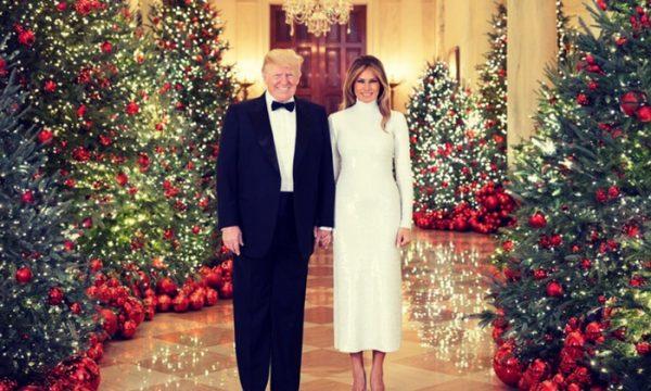 President Donald Trump and First Lady Melania Trump in their official 2018 Christmas portrait at the Cross Hall of the White House, on Dec. 15, 2018. (Andrea Hanks/White House)