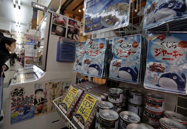 Packs of whale meat to be sold hang at a whale meat specialty store at Tokyo’s Ameyoko shopping district in Japan, on March 27, 2014. (Shizuo Kambayashi/AP)