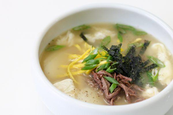 Tteokguk, rice cake soup, is served on New Year’s Day in Korea to signify a long life. (Courtesy of Bobby Yoon)
