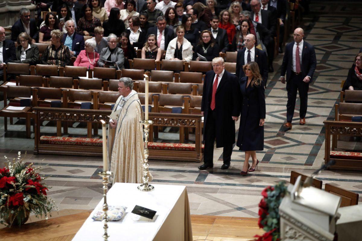 President Donald Trump and First Lady Melania Trump arrive for a Christmas Eve service at the National Cathedral in Washington on Dec. 24, 2018. (Jacquelyn Martin/AP Photo)
