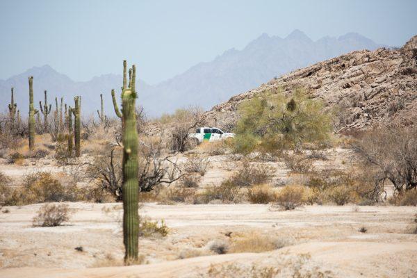 A Border Patrol agent drives near the U.S.–Mexico border in the desert near Yuma, Ariz., on May 25, 2018. (Samira Bouaou/The Epoch Times)