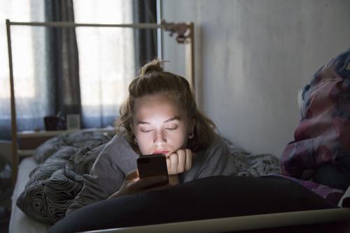 As of 2016, the average teen spent about six hours a day immersed in digital media. (Shutterstock)