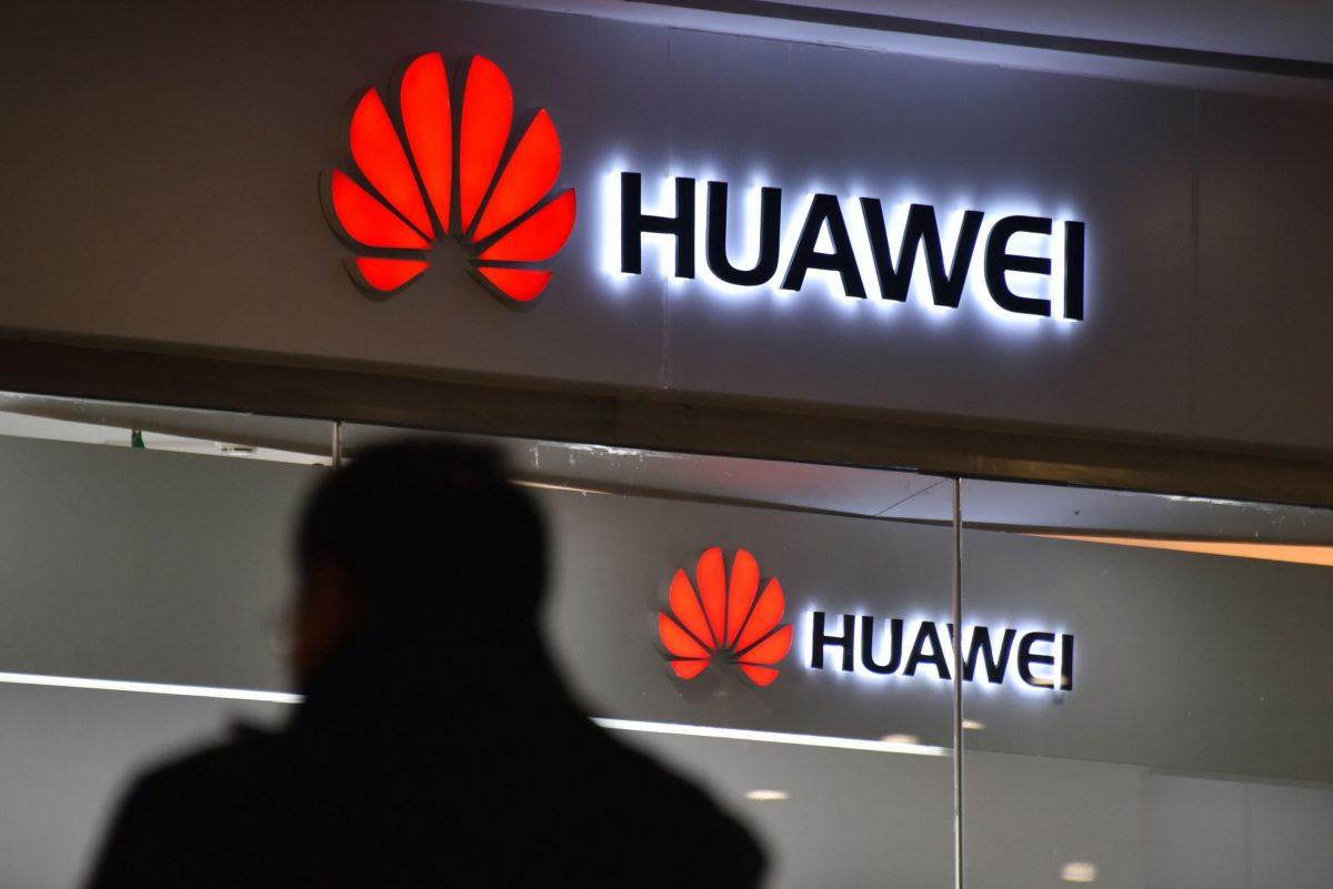 A man walks past a Huawei store in Beijing on Dec. 10, 2018. (GREG BAKER/AFP/Getty Images)