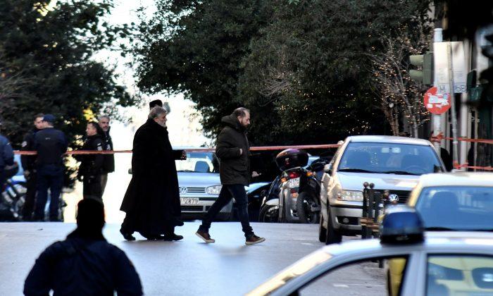 Explosive Device Detonates Outside Athens Church, Injuring Two People