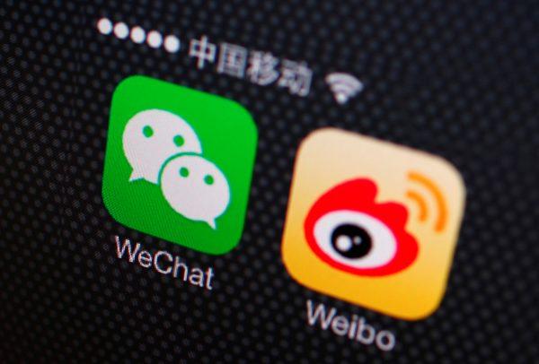 Icons of WeChat and Weibo apps are seen on a smartphone in this picture illustration taken on Dec. 5, 2013. (Petar Kujundzic/Reuters)