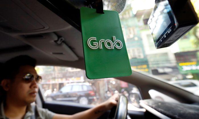 Ride-Hailing Company Grab Ordered to Pay Compensation to Vietnamese Taxi Firm