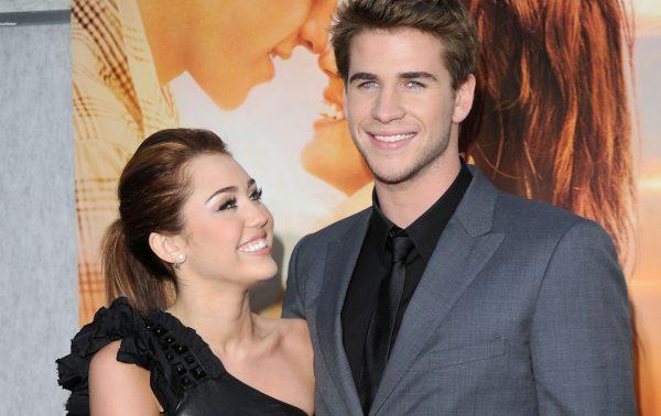 Miley Cyrus and Liam Hemsworth arrive at "The Last Song" premiere in Hollywood, March 25, 2010. (Jason Merritt/Getty Images)