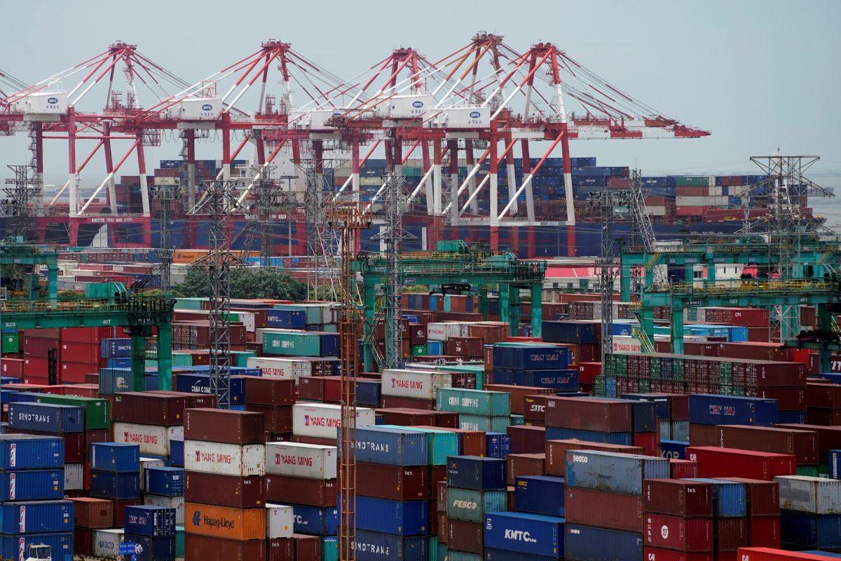 Shipping containers are seen at a port in Shanghai, China on July 10, 2018. (Aly Song/Reuters)