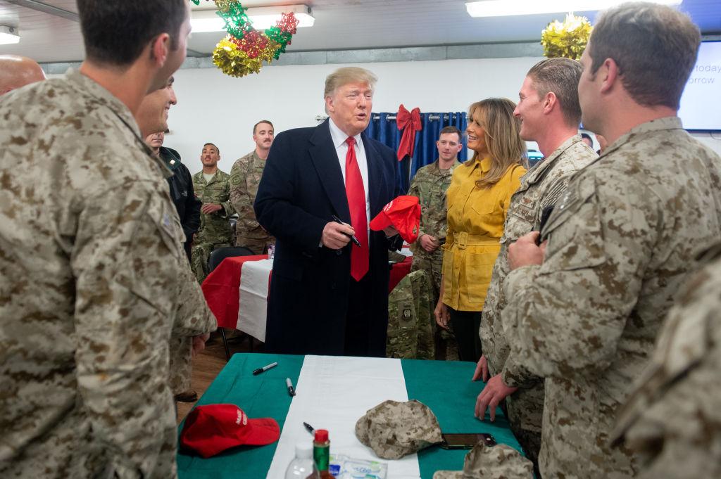 President Donald Trump and First Lady Melania Trump greet members of the U.S. military during an unannounced trip to Al Asad Air Base in Iraq on Dec. 26, 2018. (Saul Loeb/AFP/Getty Images)