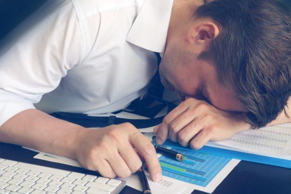Illustration - Shutterstock | <a href="https://www.shutterstock.com/image-photo/chronic-fatigue-syndrome-concept-overworked-businessman-674718391?src=cRv85Y9bl30HGyVODI1xDA-1-5">designer491</a>