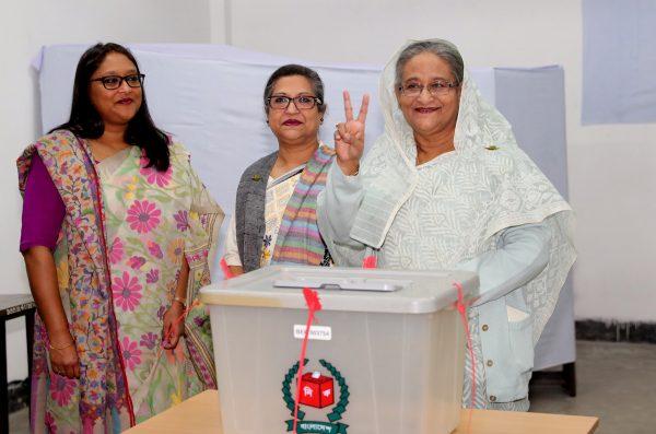 Prime Minister Sheikh Hasina gestures after casting her vote in the morning during the general election in Dhaka, Bangladesh, on Dec. 30, 2018. (Bangladesh Sangbad Sangstha/Handout/Reuters)