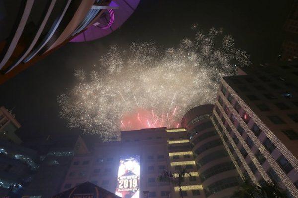 Fireworks light up the sky at the Eastwood Shopping Mall as Filipinos welcome the New Year in suburban Quezon city northeast of Manila, Philippines on Jan. 1, 2019. (Bullit Marquez/AP)