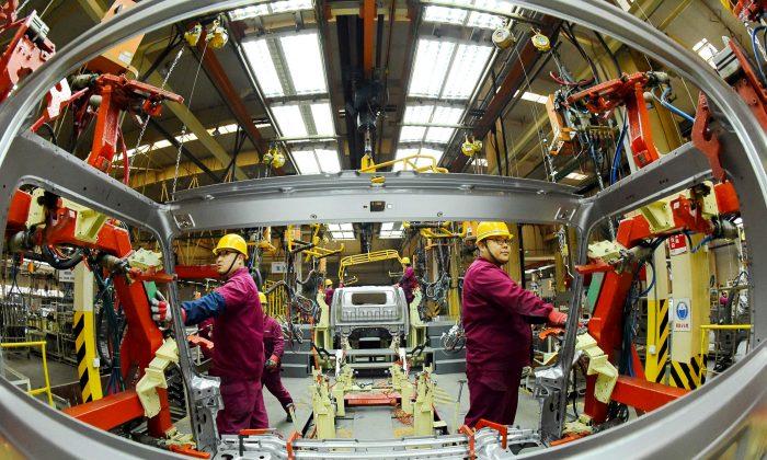 China Factory Activity Shrinks for First Time in Over 2 Years Amid Trade Friction