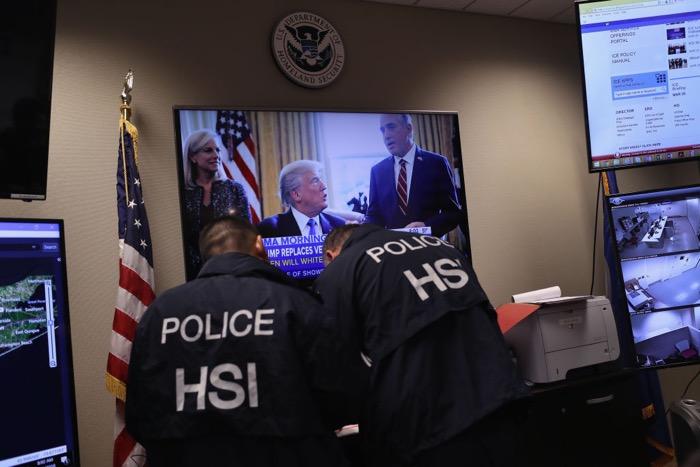 Homeland Security Investigations (HSI) ICE agents work in a control center as field agents arrest suspected immigrant gang members in New York on March 29, 2018. (John Moore/Getty Images)