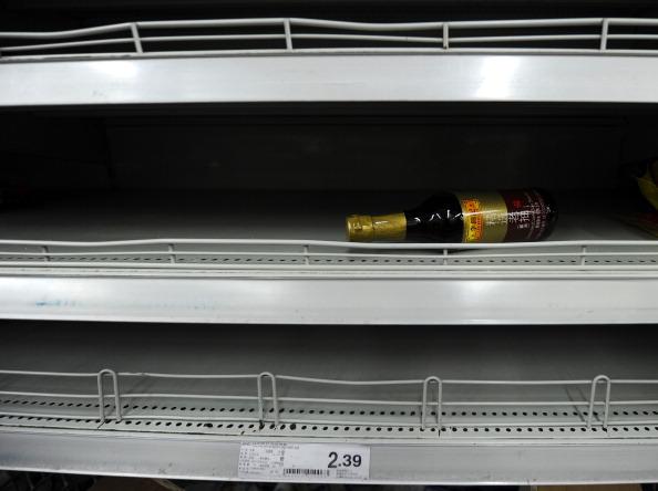 A lone bottle of soy sauce rests on a shelf in a supermarket in Beijing on March 17, 2011. (Liu Jin/AFP/Getty Images)