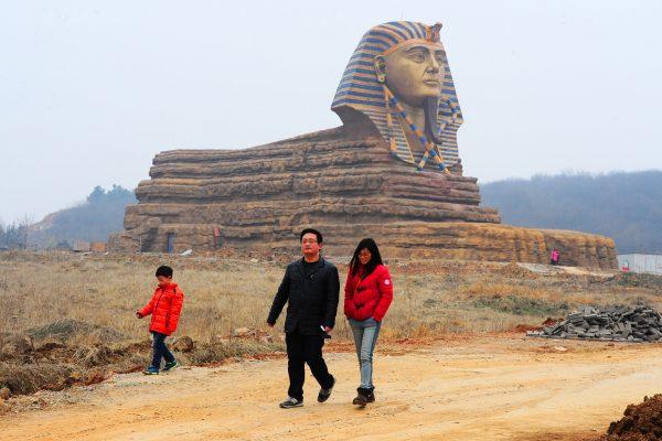 Tourists visit a full-size replica of the Great Sphinx on March 14, 2015 in Chuzhou, Anhui province of China. (VCG/Getty Images)