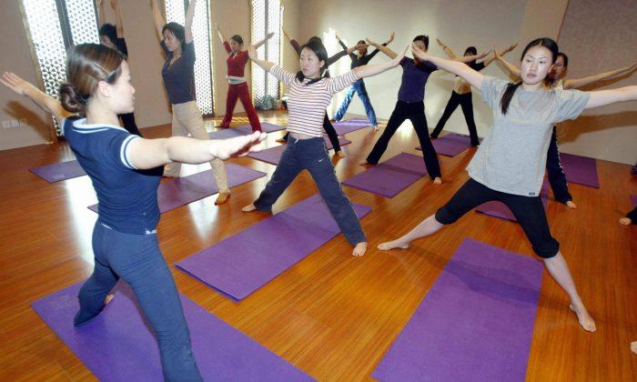 Chinese Woman Snaps Leg During Yoga Session, Wins Payout
