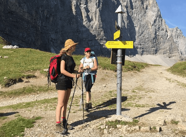 Hikers, family members of the photographer, on day three of a four-day, 50km hike across the Karwendel mountain range descend into the Eng valley near Eng Alm, Austria on Aug. 9, 2015. (Sean Gallup/Getty Images)