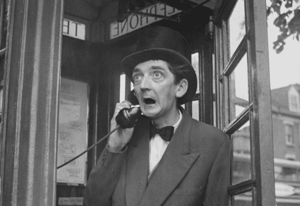 British comic actor Ted Lune (1920 - 1968) in a telephone booth in London, May 1957. (Chris Ware/Keystone Features/Hulton Archive/Getty Images)