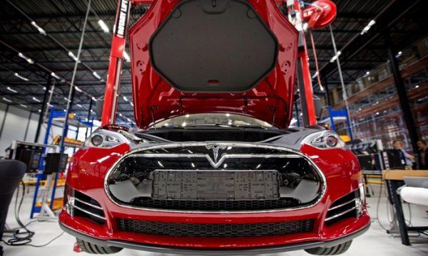 Fully electric Tesla car on an assembly line at Tesla Motors car factory in Tilburg, the Netherlands on Aug. 22, 2013. (Guus Schoonewille/AFP/Getty Images)