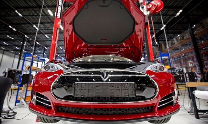 Fully electric Tesla car on an assembly line at Tesla Motors car factory in Tilburg, the Netherlands, on Aug. 22, 2013. (Guus Schoonewille/AFP/Getty Images)