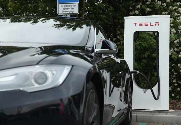 Tesla electric-powered sedan at a Tesla charging station in Rieden, Germany, on June 11, 2015. (Sean Gallup/Getty Images)
