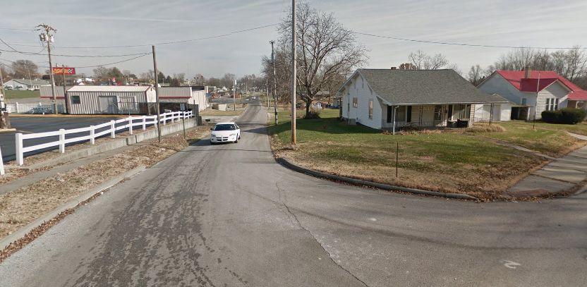 The worker went to the house on Grove Street in the southern Indiana town of Washington. This photo shows the Grove Street neighborhood. (Google Street View)