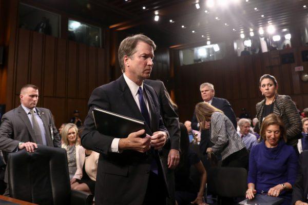 Judge Brett Kavanaugh departs after testifying before the Senate Judiciary Committee during the first day of his confirmation hearing to serve as Associate Justice on the U.S. Supreme Court at the Capitol in Washington on Sept. 4, 2018. (Samira Bouaou/The Epoch Times)